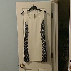 White mini dress with black lace